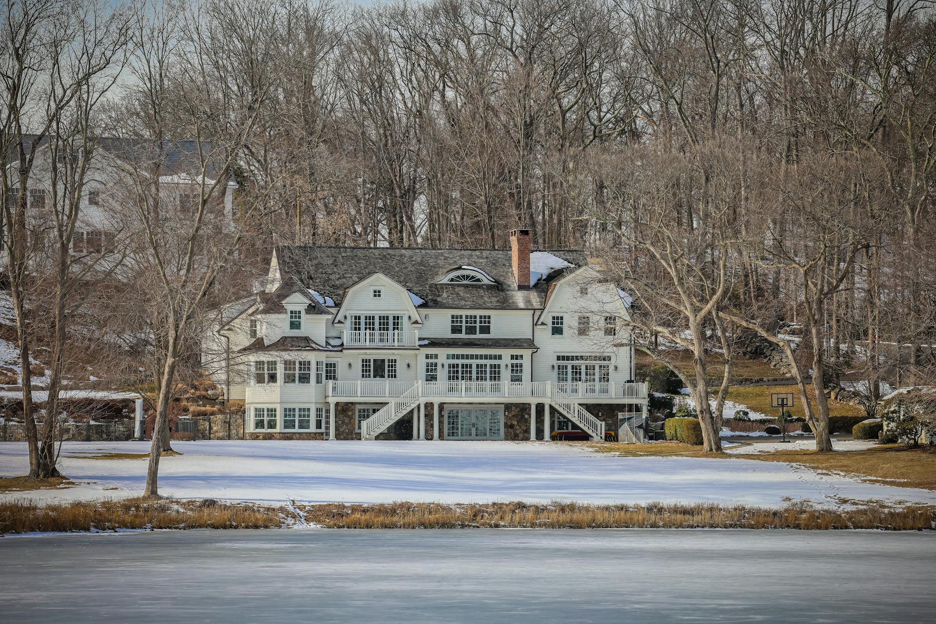 Beautiful winter view of a waterfront estate in Darien, Connecticut.